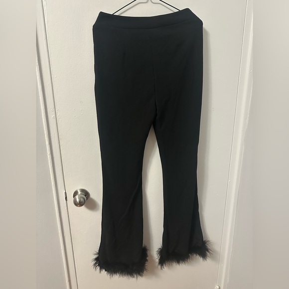 Pants with slit and faux fur - Picture 1 of 7
